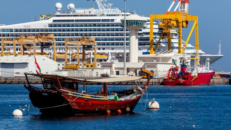A traditional dhow and a cruise ship in Muscat. Crude oil exports make up 70% of Oman's revenue